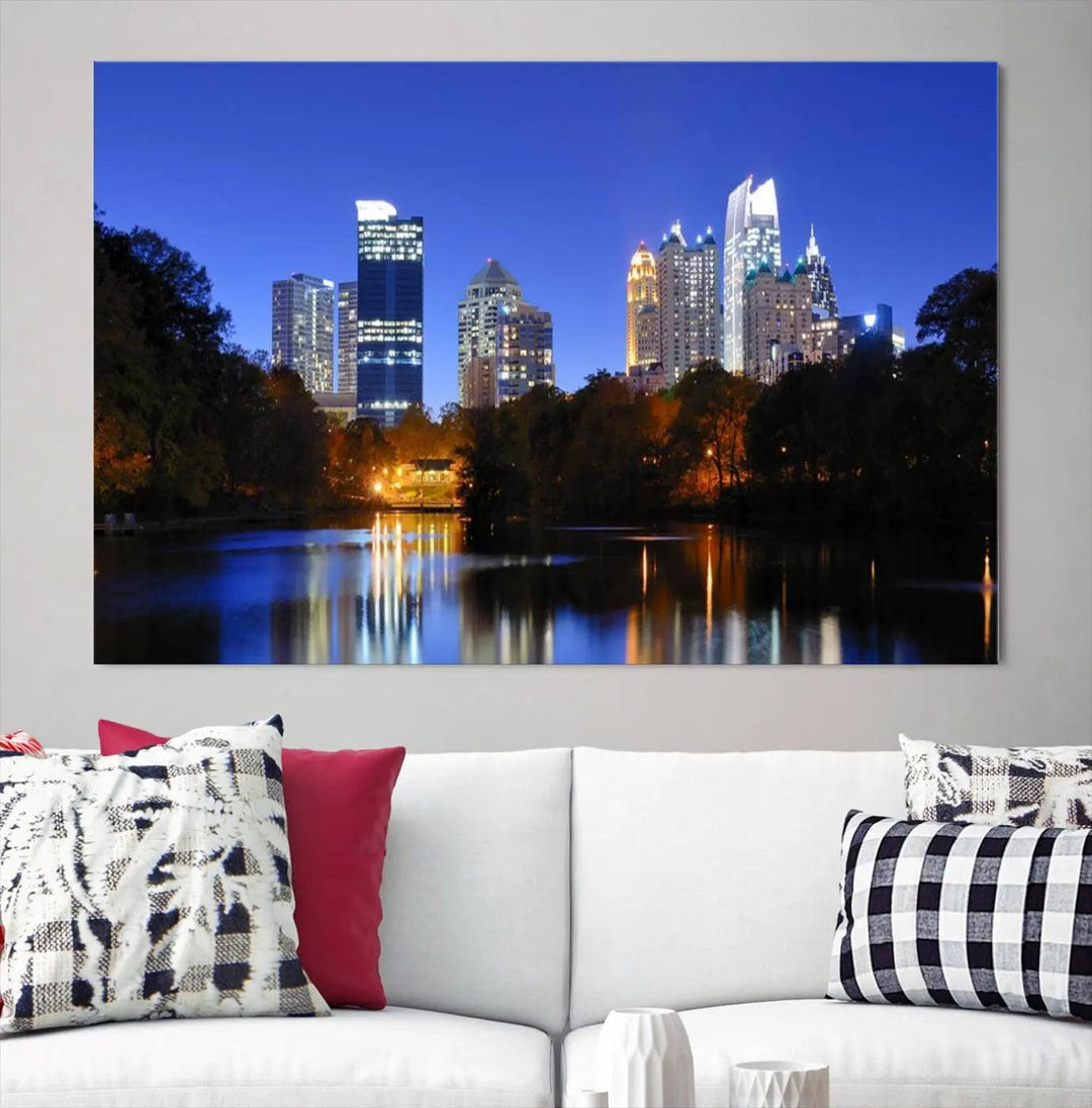 The Atlanta City Lights Night Blue Skyline is a triptych showcasing a night cityscape on museum-quality canvas.