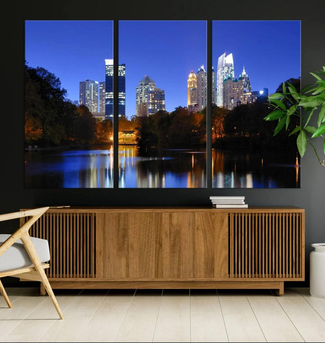 The Atlanta City Lights Night Blue Skyline is a triptych showcasing a night cityscape on museum-quality canvas.