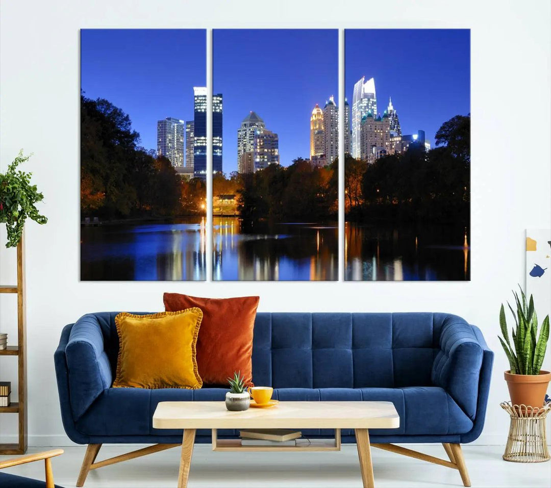 The Atlanta City Lights Night Blue Skyline is a triptych showcasing a night cityscape on museum-quality canvas.