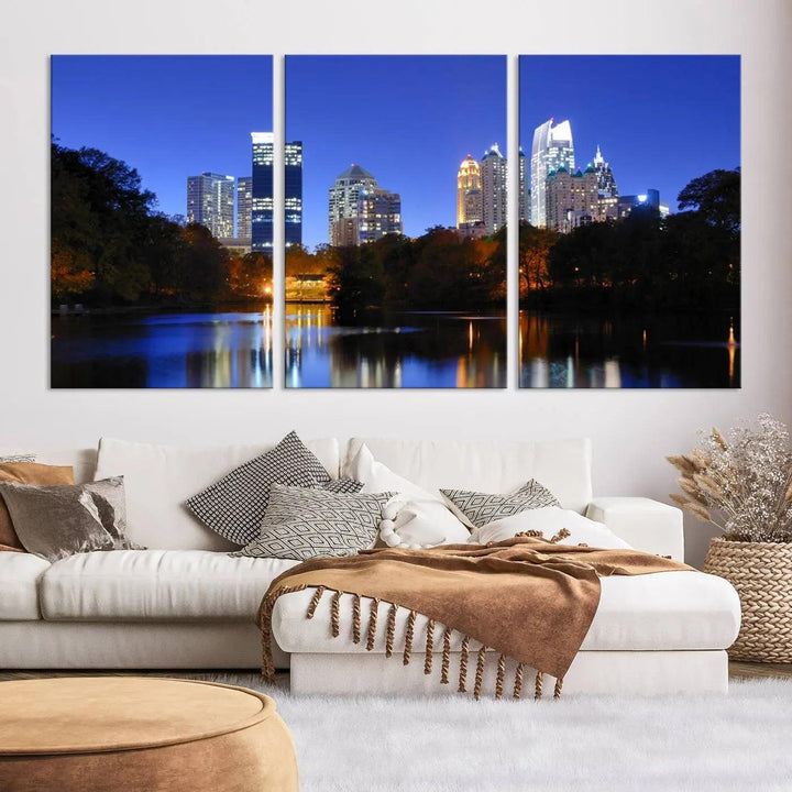 The Atlanta City Lights Night Blue Skyline is a triptych showcasing a night cityscape on museum-quality canvas.