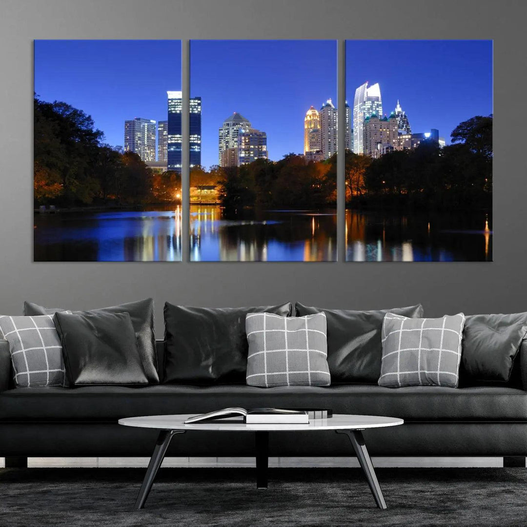 The Atlanta City Lights Night Blue Skyline is a triptych showcasing a night cityscape on museum-quality canvas.