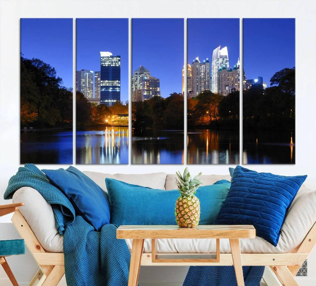 The Atlanta City Lights Night Blue Skyline is a triptych showcasing a night cityscape on museum-quality canvas.