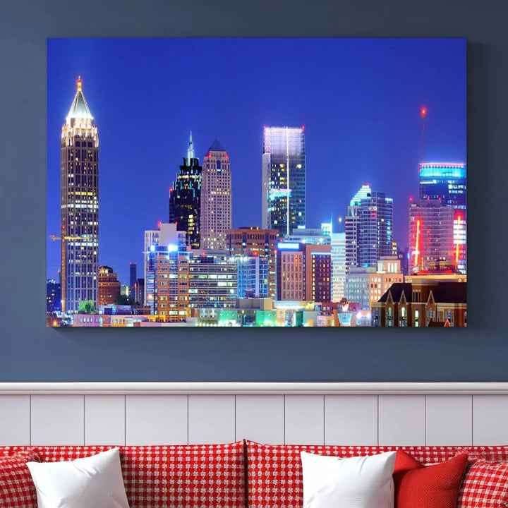 The modern living room is enhanced by the elegance of the "Atlanta City Lights Night Blue Skyline Cityscape Wall Art Canvas Print." This triptych, crafted on museum-quality canvas with a UV-protective coating, arrives ready to hang on the wall.