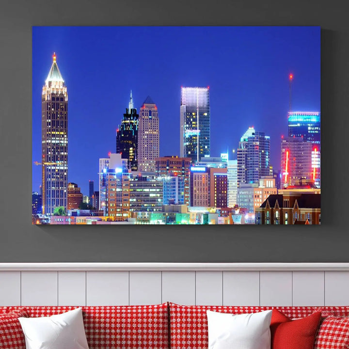 The modern living room is enhanced by the elegance of the "Atlanta City Lights Night Blue Skyline Cityscape Wall Art Canvas Print." This triptych, crafted on museum-quality canvas with a UV-protective coating, arrives ready to hang on the wall.