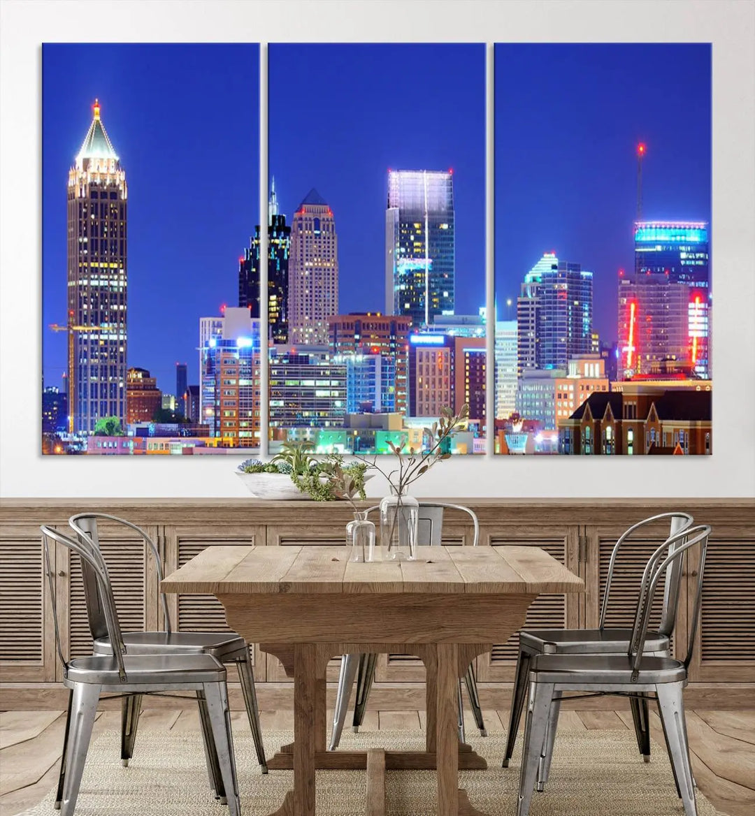 The modern living room is enhanced by the elegance of the "Atlanta City Lights Night Blue Skyline Cityscape Wall Art Canvas Print." This triptych, crafted on museum-quality canvas with a UV-protective coating, arrives ready to hang on the wall.