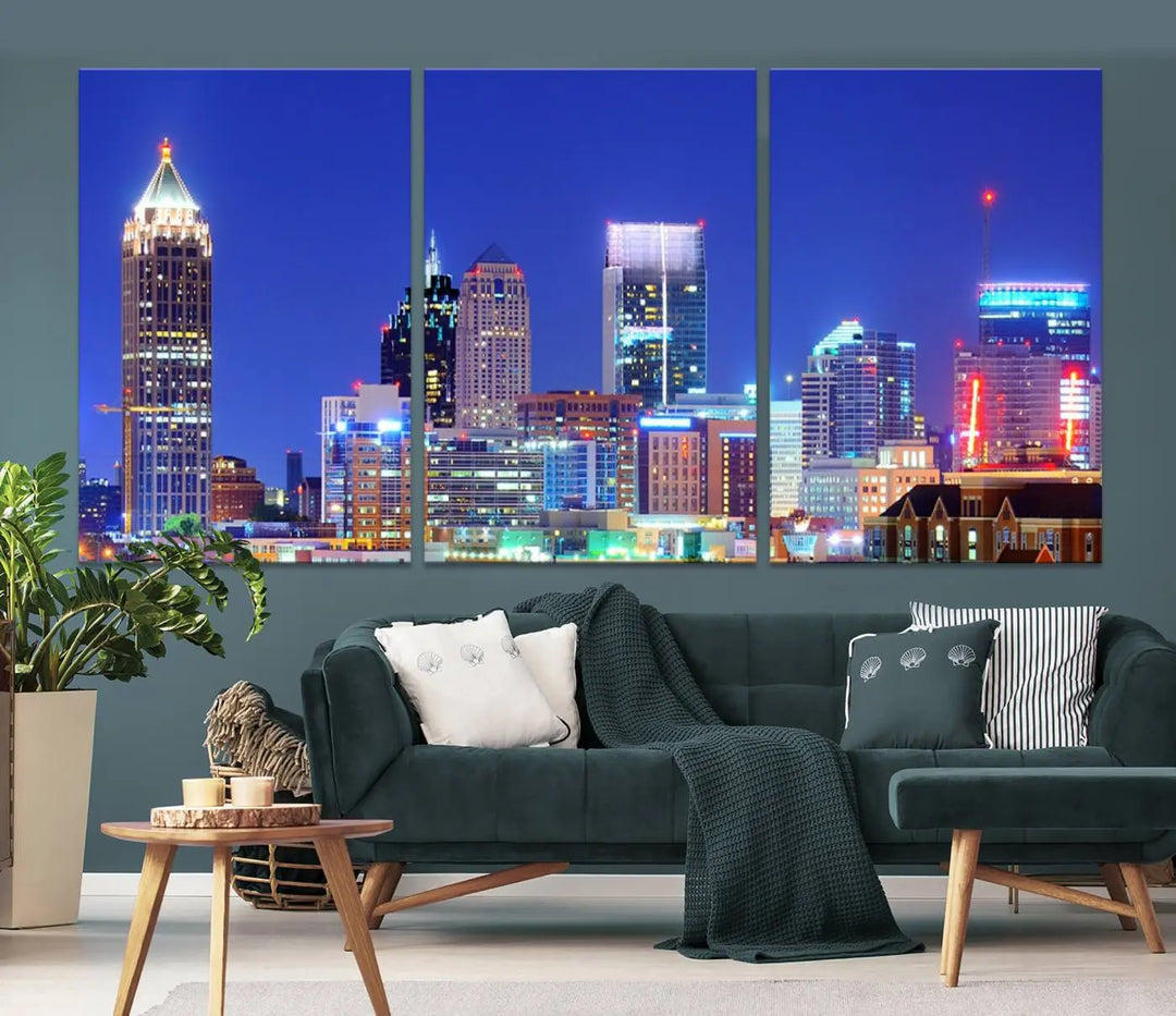 The modern living room is enhanced by the elegance of the "Atlanta City Lights Night Blue Skyline Cityscape Wall Art Canvas Print." This triptych, crafted on museum-quality canvas with a UV-protective coating, arrives ready to hang on the wall.