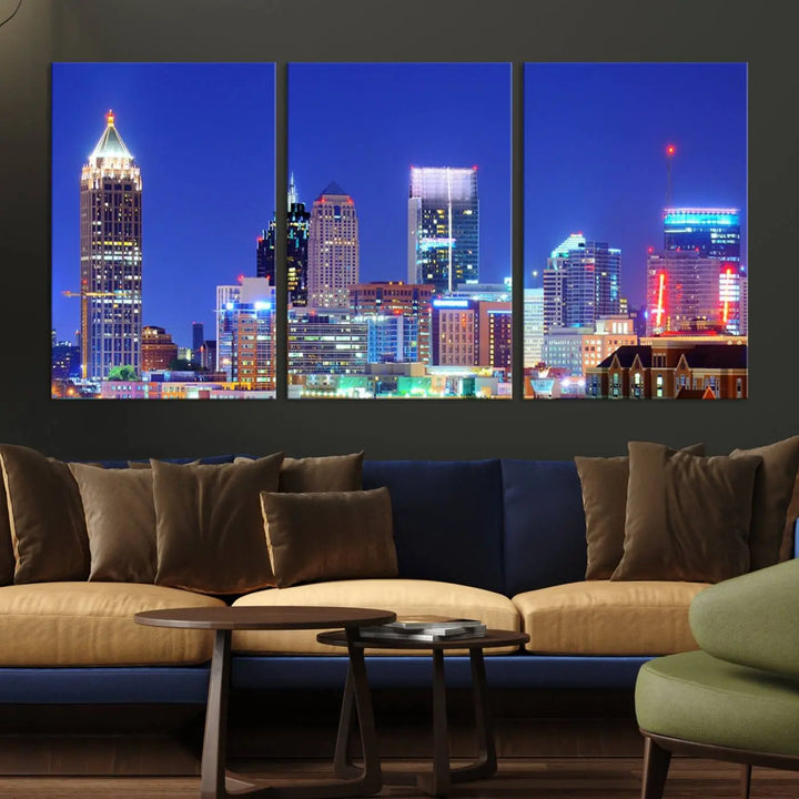 The modern living room is enhanced by the elegance of the "Atlanta City Lights Night Blue Skyline Cityscape Wall Art Canvas Print." This triptych, crafted on museum-quality canvas with a UV-protective coating, arrives ready to hang on the wall.