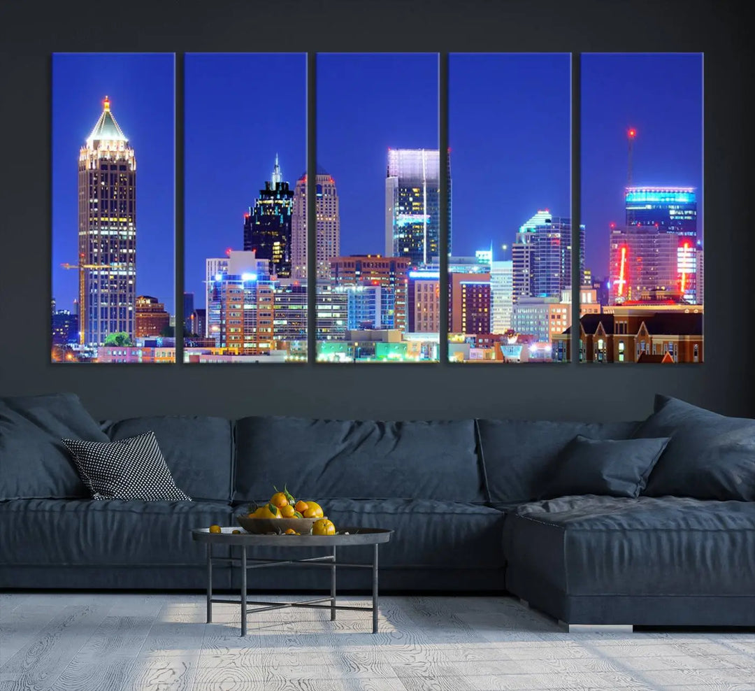 The modern living room is enhanced by the elegance of the "Atlanta City Lights Night Blue Skyline Cityscape Wall Art Canvas Print." This triptych, crafted on museum-quality canvas with a UV-protective coating, arrives ready to hang on the wall.