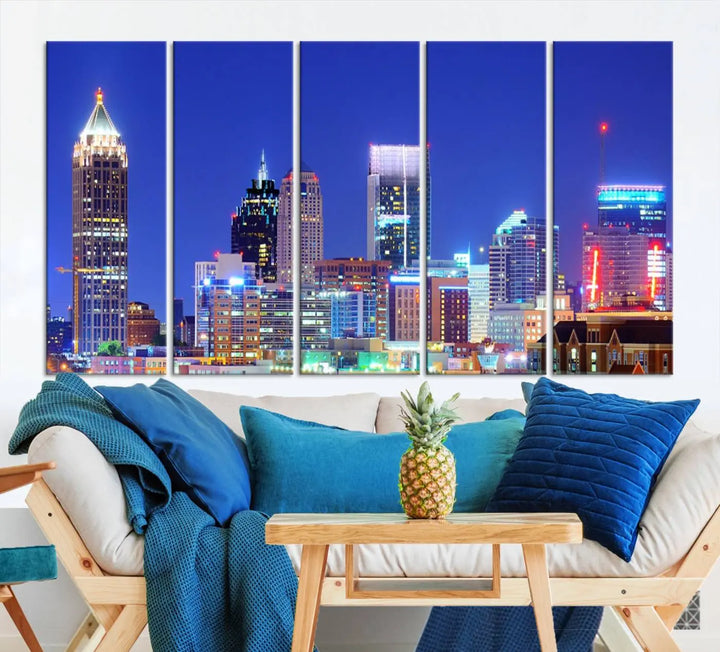 The modern living room is enhanced by the elegance of the "Atlanta City Lights Night Blue Skyline Cityscape Wall Art Canvas Print." This triptych, crafted on museum-quality canvas with a UV-protective coating, arrives ready to hang on the wall.