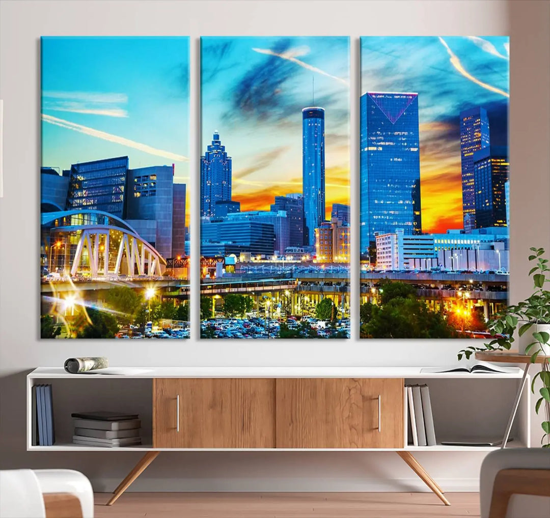 The Atlanta City Lights Sunset Blue and Orange Skyline Cityscape View Wall Art Canvas Print, crafted with vibrant colors on museum-quality canvas and a UV-protective coating, enhances the space in the living room.