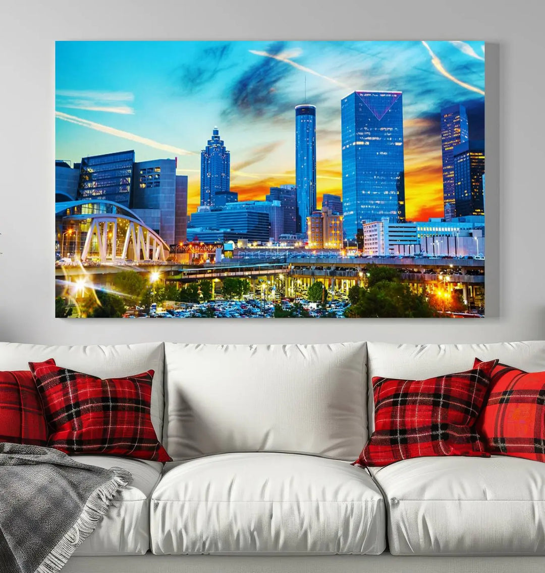 The Atlanta City Lights Sunset Blue and Orange Skyline Cityscape View Wall Art Canvas Print, crafted with vibrant colors on museum-quality canvas and a UV-protective coating, enhances the space in the living room.