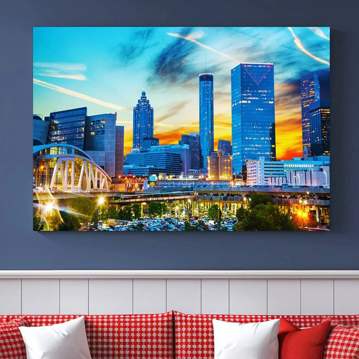 The Atlanta City Lights Sunset Blue and Orange Skyline Cityscape View Wall Art Canvas Print, crafted with vibrant colors on museum-quality canvas and a UV-protective coating, enhances the space in the living room.