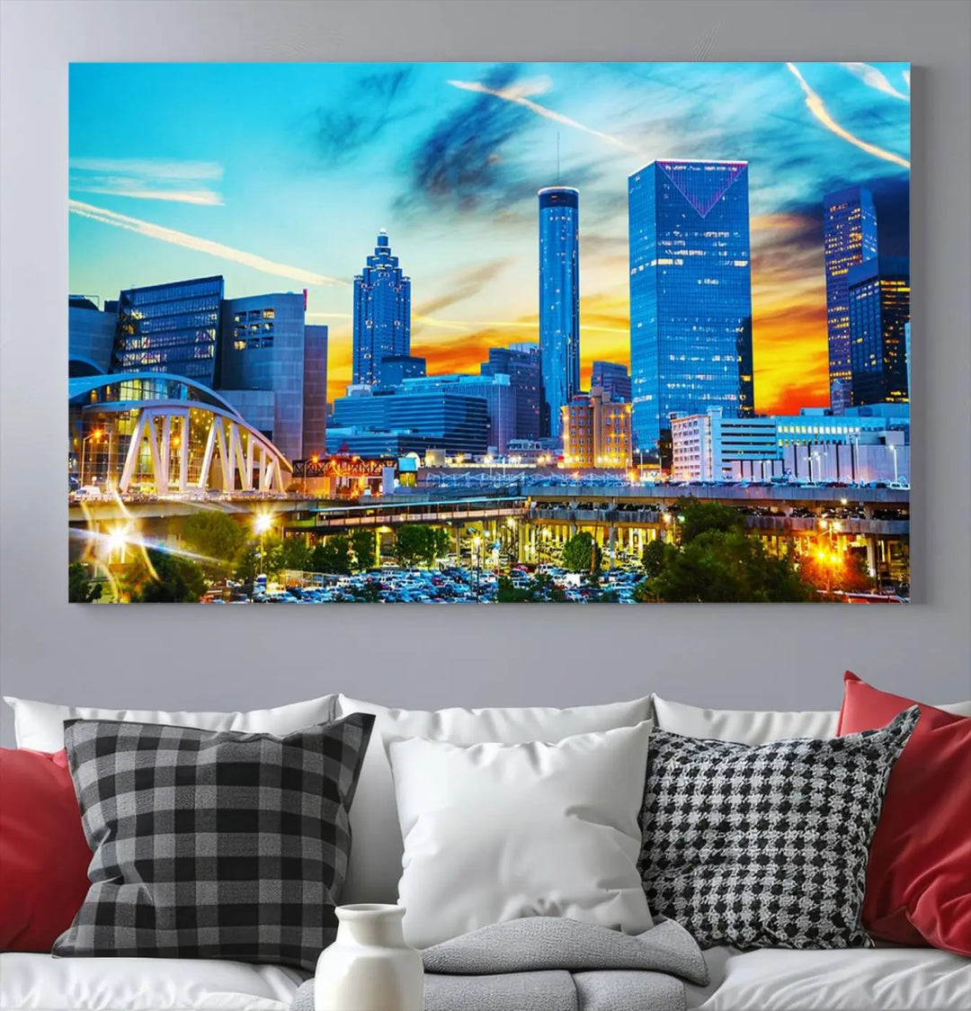 The Atlanta City Lights Sunset Blue and Orange Skyline Cityscape View Wall Art Canvas Print, crafted with vibrant colors on museum-quality canvas and a UV-protective coating, enhances the space in the living room.