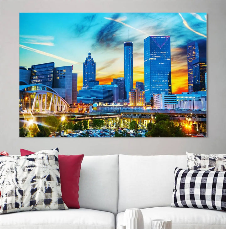 The Atlanta City Lights Sunset Blue and Orange Skyline Cityscape View Wall Art Canvas Print, crafted with vibrant colors on museum-quality canvas and a UV-protective coating, enhances the space in the living room.