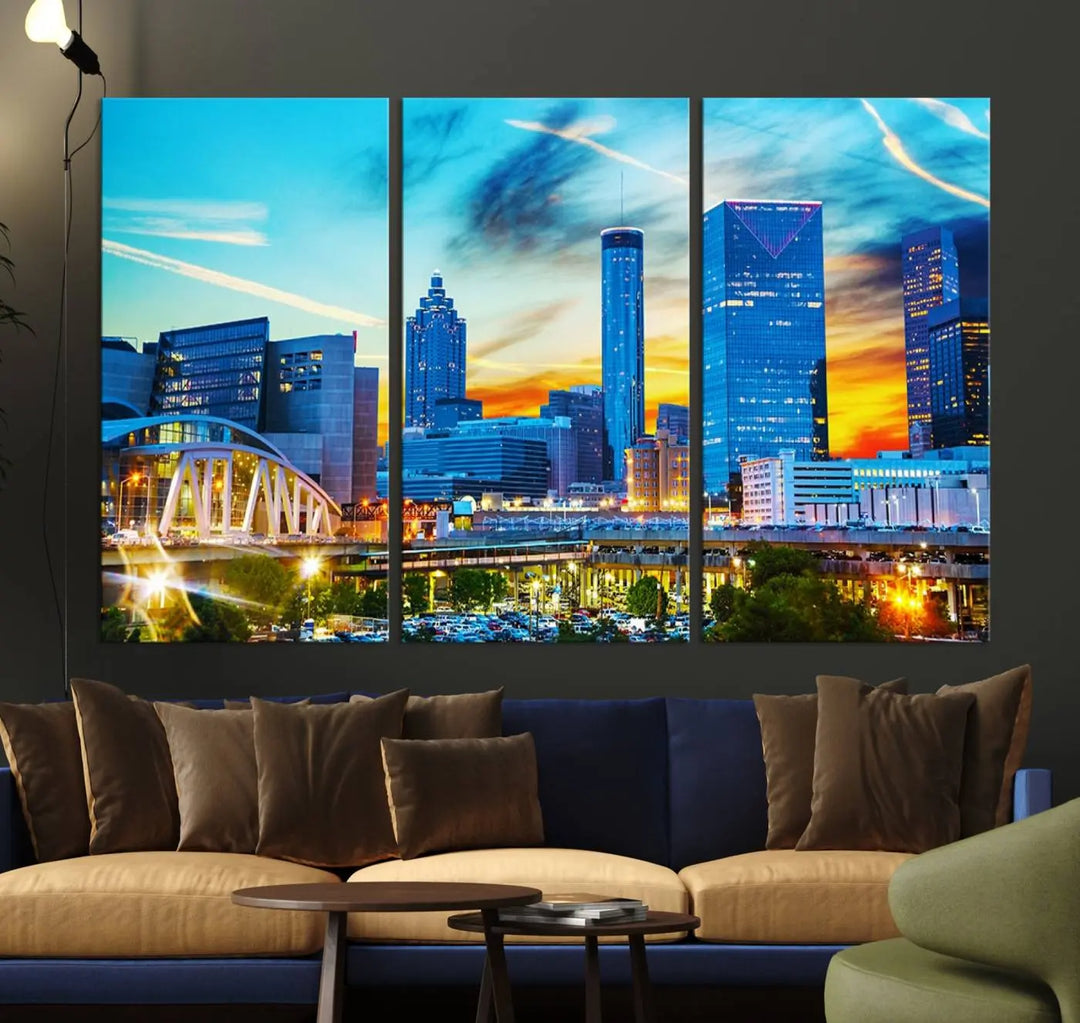 The Atlanta City Lights Sunset Blue and Orange Skyline Cityscape View Wall Art Canvas Print, crafted with vibrant colors on museum-quality canvas and a UV-protective coating, enhances the space in the living room.