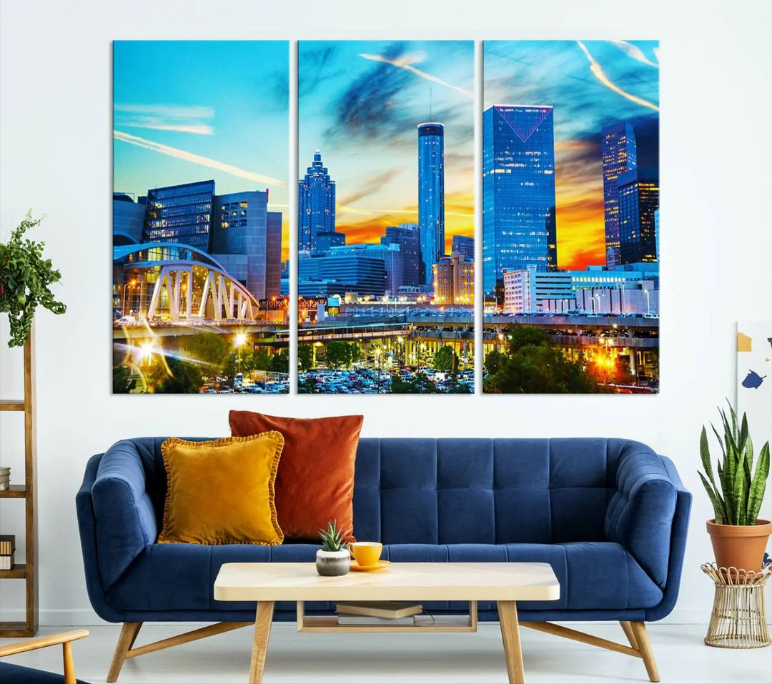 The Atlanta City Lights Sunset Blue and Orange Skyline Cityscape View Wall Art Canvas Print, crafted with vibrant colors on museum-quality canvas and a UV-protective coating, enhances the space in the living room.