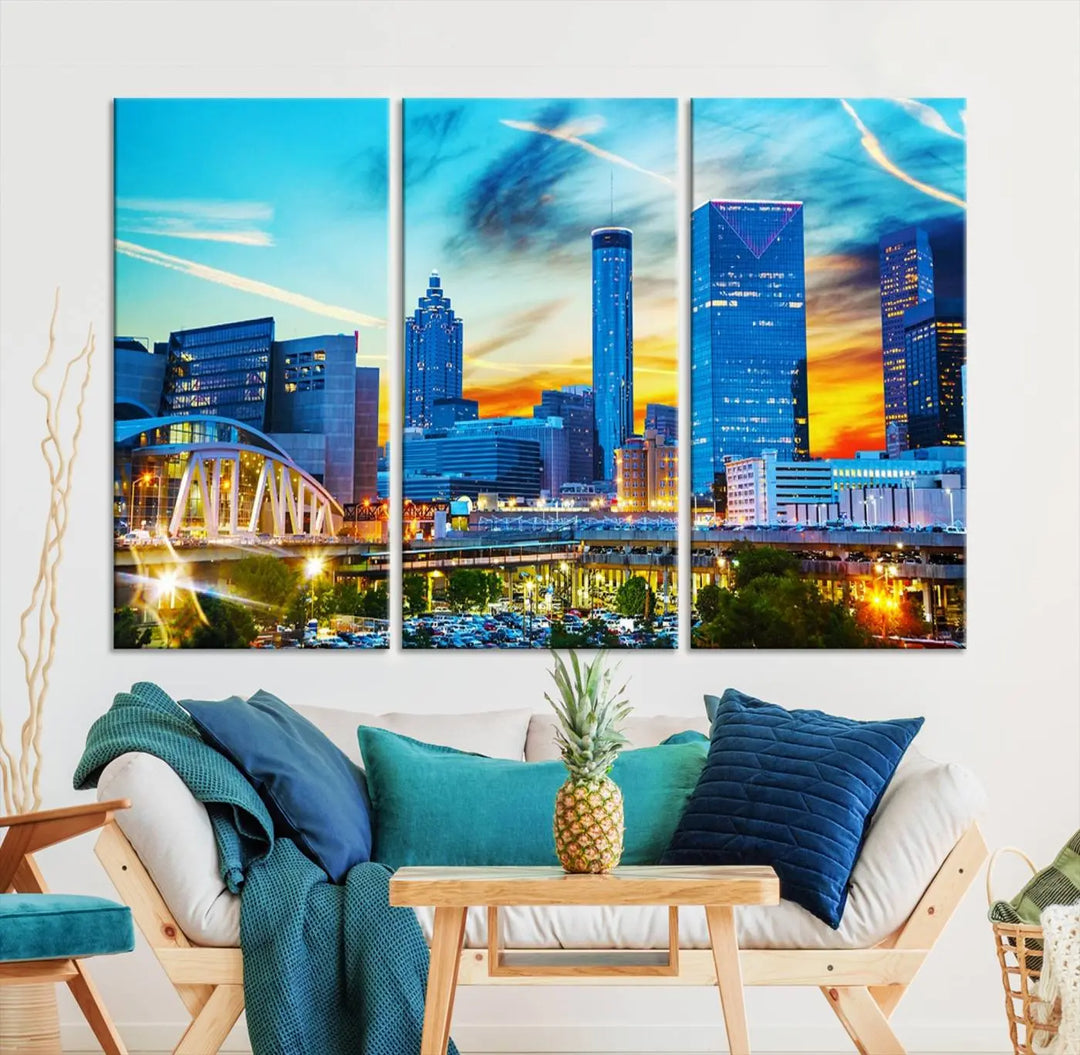 The Atlanta City Lights Sunset Blue and Orange Skyline Cityscape View Wall Art Canvas Print, crafted with vibrant colors on museum-quality canvas and a UV-protective coating, enhances the space in the living room.