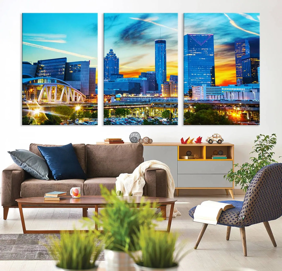 The Atlanta City Lights Sunset Blue and Orange Skyline Cityscape View Wall Art Canvas Print, crafted with vibrant colors on museum-quality canvas and a UV-protective coating, enhances the space in the living room.