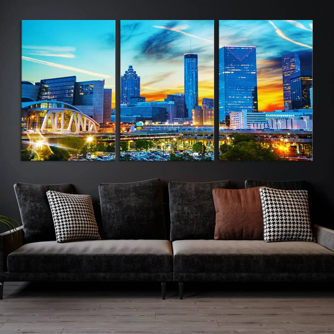 The Atlanta City Lights Sunset Blue and Orange Skyline Cityscape View Wall Art Canvas Print, crafted with vibrant colors on museum-quality canvas and a UV-protective coating, enhances the space in the living room.