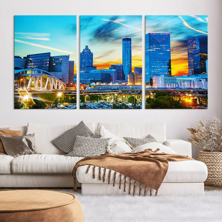 The Atlanta City Lights Sunset Blue and Orange Skyline Cityscape View Wall Art Canvas Print, crafted with vibrant colors on museum-quality canvas and a UV-protective coating, enhances the space in the living room.