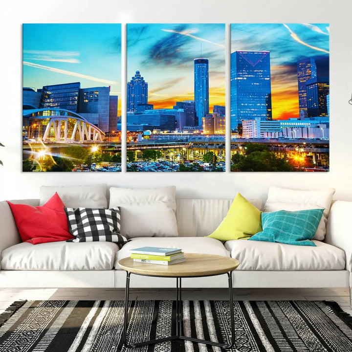 The Atlanta City Lights Sunset Blue and Orange Skyline Cityscape View Wall Art Canvas Print, crafted with vibrant colors on museum-quality canvas and a UV-protective coating, enhances the space in the living room.