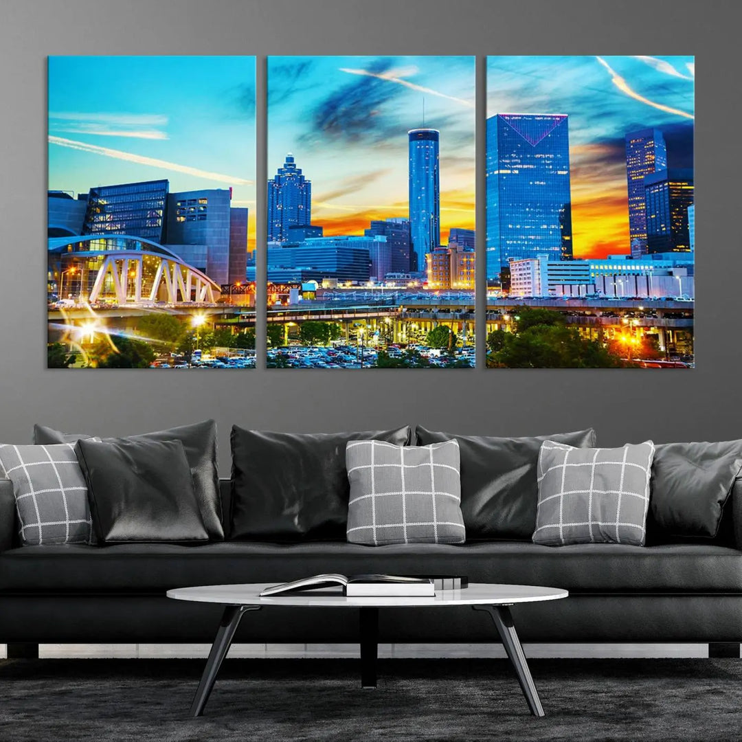 The Atlanta City Lights Sunset Blue and Orange Skyline Cityscape View Wall Art Canvas Print, crafted with vibrant colors on museum-quality canvas and a UV-protective coating, enhances the space in the living room.