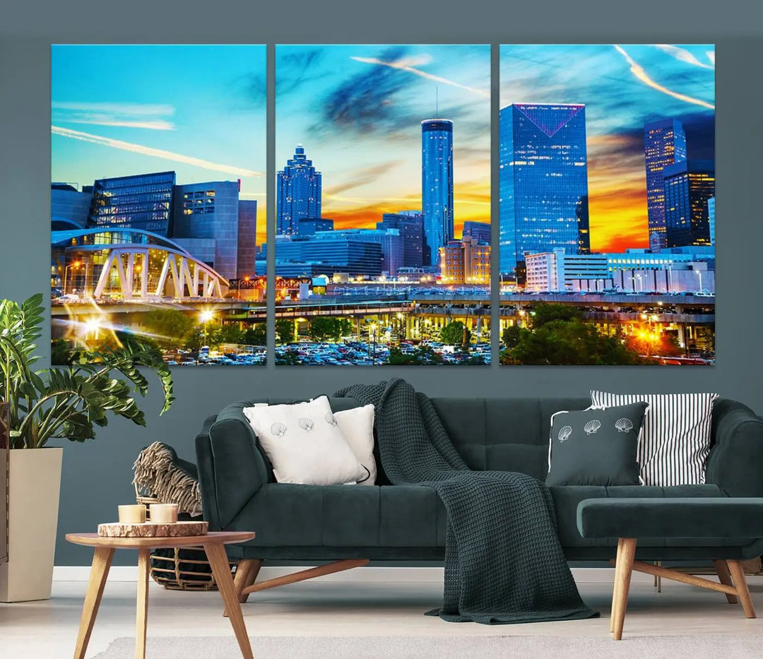 The Atlanta City Lights Sunset Blue and Orange Skyline Cityscape View Wall Art Canvas Print, crafted with vibrant colors on museum-quality canvas and a UV-protective coating, enhances the space in the living room.