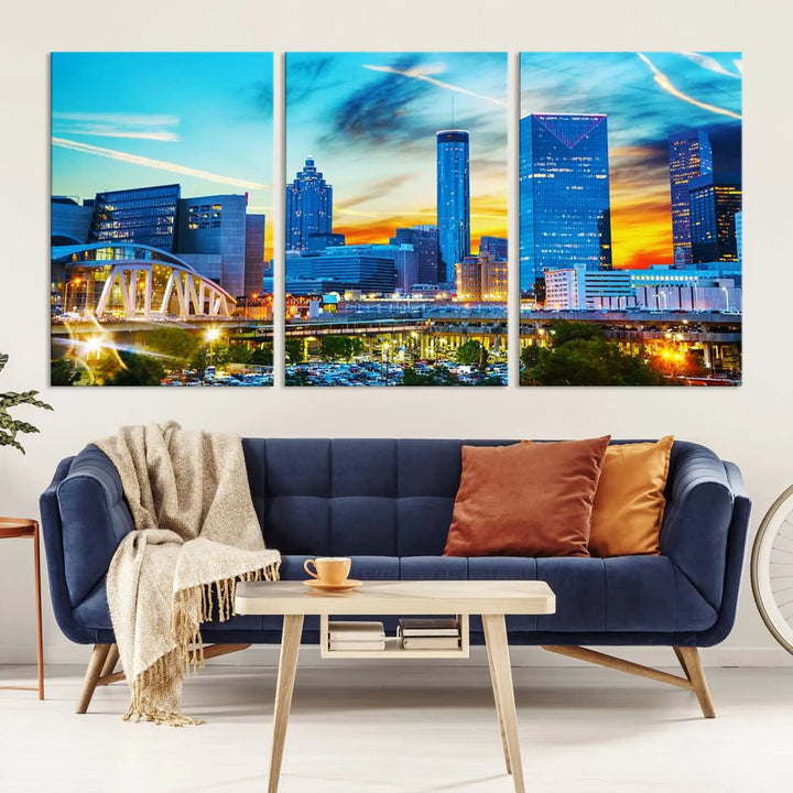 The Atlanta City Lights Sunset Blue and Orange Skyline Cityscape View Wall Art Canvas Print, crafted with vibrant colors on museum-quality canvas and a UV-protective coating, enhances the space in the living room.