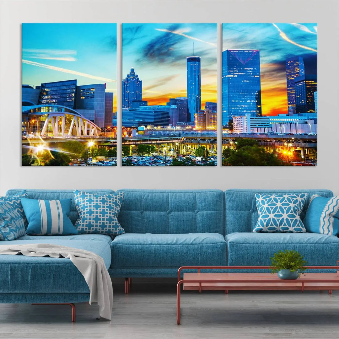 The Atlanta City Lights Sunset Blue and Orange Skyline Cityscape View Wall Art Canvas Print, crafted with vibrant colors on museum-quality canvas and a UV-protective coating, enhances the space in the living room.