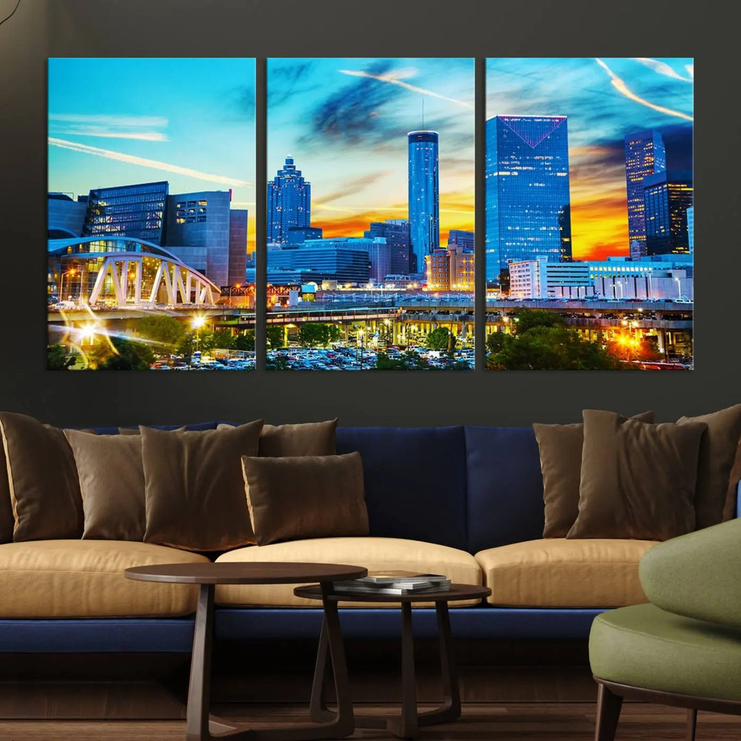 The Atlanta City Lights Sunset Blue and Orange Skyline Cityscape View Wall Art Canvas Print, crafted with vibrant colors on museum-quality canvas and a UV-protective coating, enhances the space in the living room.