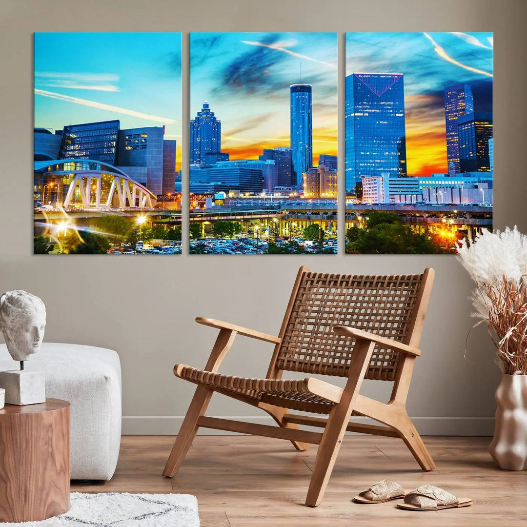 The Atlanta City Lights Sunset Blue and Orange Skyline Cityscape View Wall Art Canvas Print, crafted with vibrant colors on museum-quality canvas and a UV-protective coating, enhances the space in the living room.