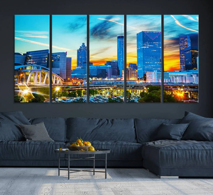 The Atlanta City Lights Sunset Blue and Orange Skyline Cityscape View Wall Art Canvas Print, crafted with vibrant colors on museum-quality canvas and a UV-protective coating, enhances the space in the living room.