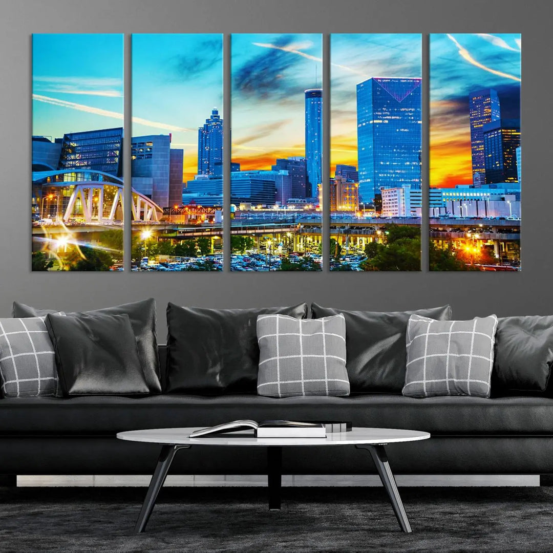 The Atlanta City Lights Sunset Blue and Orange Skyline Cityscape View Wall Art Canvas Print, crafted with vibrant colors on museum-quality canvas and a UV-protective coating, enhances the space in the living room.