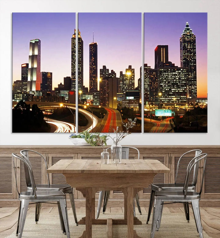 The Atlanta City Lights Sunset Purple Skyline Cityscape View wall art canvas print on the wall adds a touch of sophistication and transforms the space into an elegant sanctuary. The gallery-wrapped canvas print enhances the room's ambiance with its striking beauty.