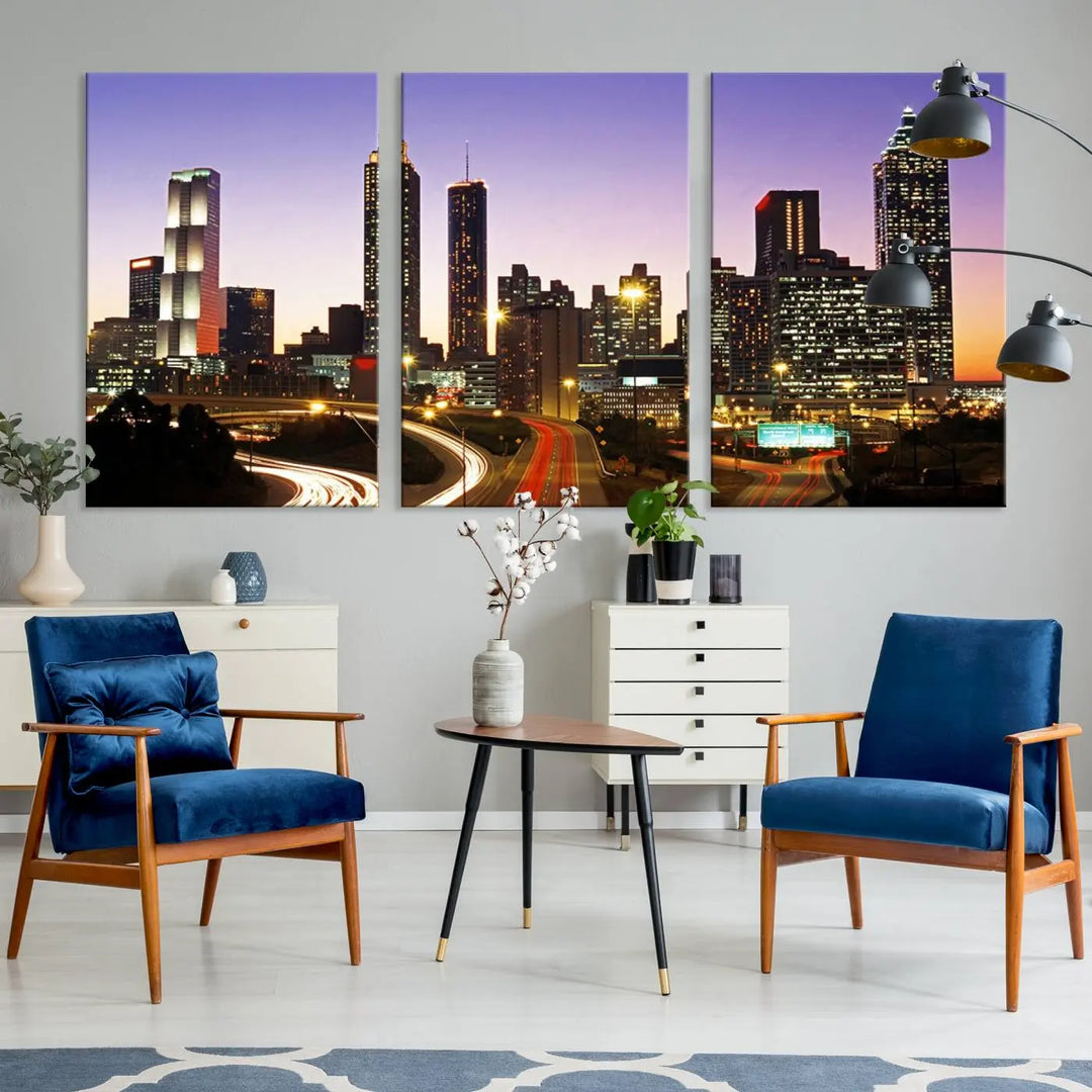 The Atlanta City Lights Sunset Purple Skyline Cityscape View wall art canvas print on the wall adds a touch of sophistication and transforms the space into an elegant sanctuary. The gallery-wrapped canvas print enhances the room's ambiance with its striking beauty.