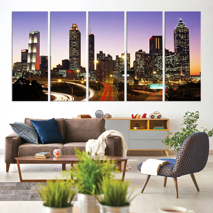 The Atlanta City Lights Sunset Purple Skyline Cityscape View wall art canvas print on the wall adds a touch of sophistication and transforms the space into an elegant sanctuary. The gallery-wrapped canvas print enhances the room's ambiance with its striking beauty.