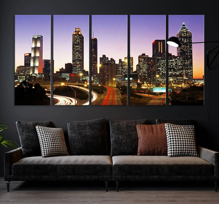 The Atlanta City Lights Sunset Purple Skyline Cityscape View wall art canvas print on the wall adds a touch of sophistication and transforms the space into an elegant sanctuary. The gallery-wrapped canvas print enhances the room's ambiance with its striking beauty.