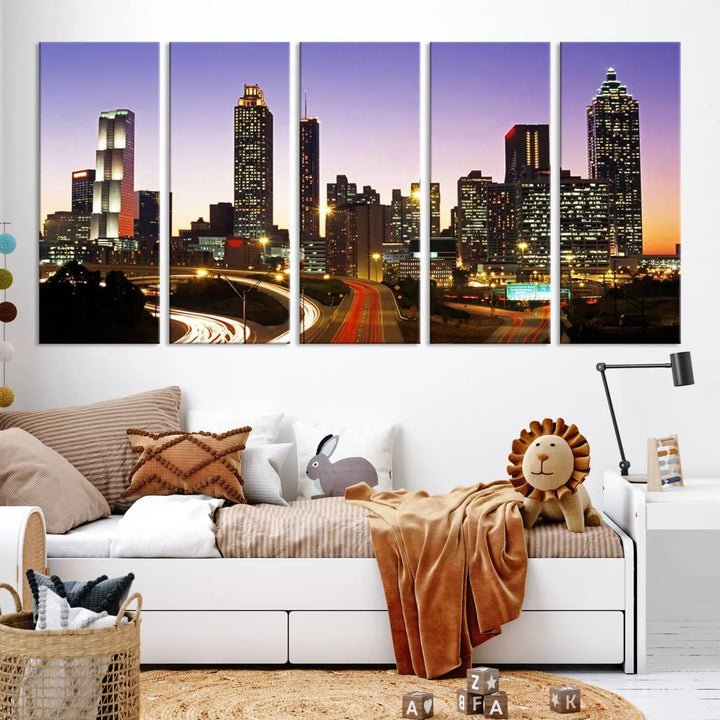 The Atlanta City Lights Sunset Purple Skyline Cityscape View wall art canvas print on the wall adds a touch of sophistication and transforms the space into an elegant sanctuary. The gallery-wrapped canvas print enhances the room's ambiance with its striking beauty.