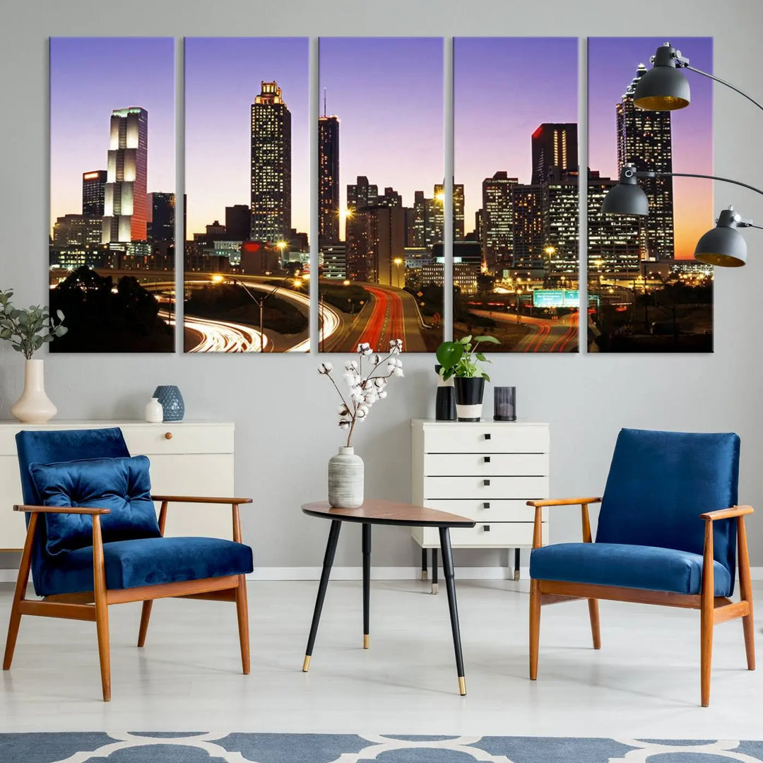 The Atlanta City Lights Sunset Purple Skyline Cityscape View wall art canvas print on the wall adds a touch of sophistication and transforms the space into an elegant sanctuary. The gallery-wrapped canvas print enhances the room's ambiance with its striking beauty.