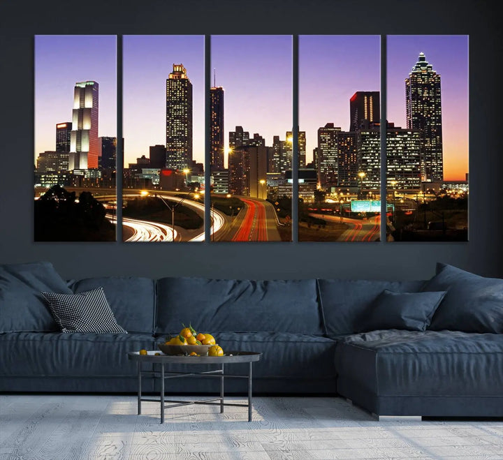 The Atlanta City Lights Sunset Purple Skyline Cityscape View wall art canvas print on the wall adds a touch of sophistication and transforms the space into an elegant sanctuary. The gallery-wrapped canvas print enhances the room's ambiance with its striking beauty.