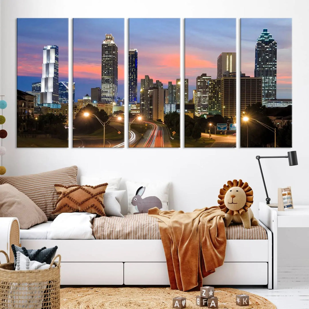 The Atlanta City Lights Sunset Skyline Cityscape View Wall Art Canvas Print is showcased in a modern living room. This artwork is gallery-wrapped on museum-quality canvas and features a UV-protective coating to maintain its vibrant colors.