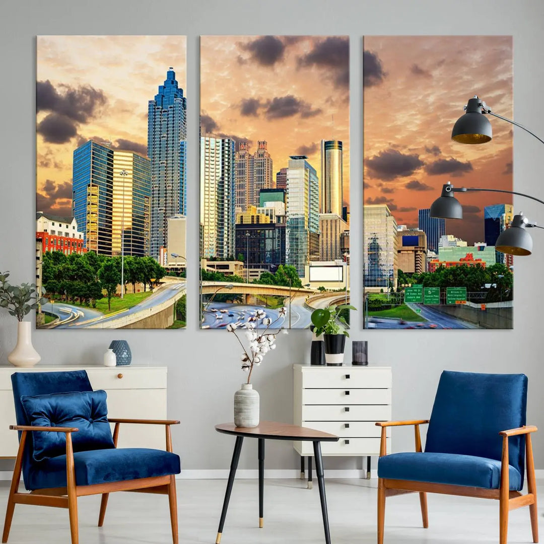 The wall is adorned with the Atlanta City Lights Sunset Skyline Cityscape View Wall Art Canvas Print, elegantly gallery wrapped and showcasing a skyline beneath a partly cloudy sky. This piece is created on museum-quality canvas and features a UV-protective coating to ensure lasting vibrancy.