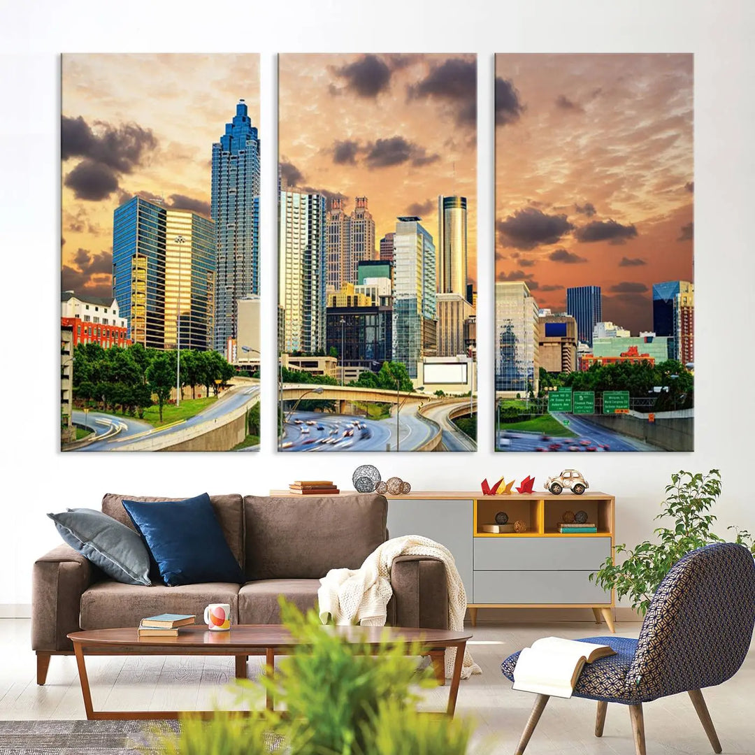 The wall is adorned with the Atlanta City Lights Sunset Skyline Cityscape View Wall Art Canvas Print, elegantly gallery wrapped and showcasing a skyline beneath a partly cloudy sky. This piece is created on museum-quality canvas and features a UV-protective coating to ensure lasting vibrancy.