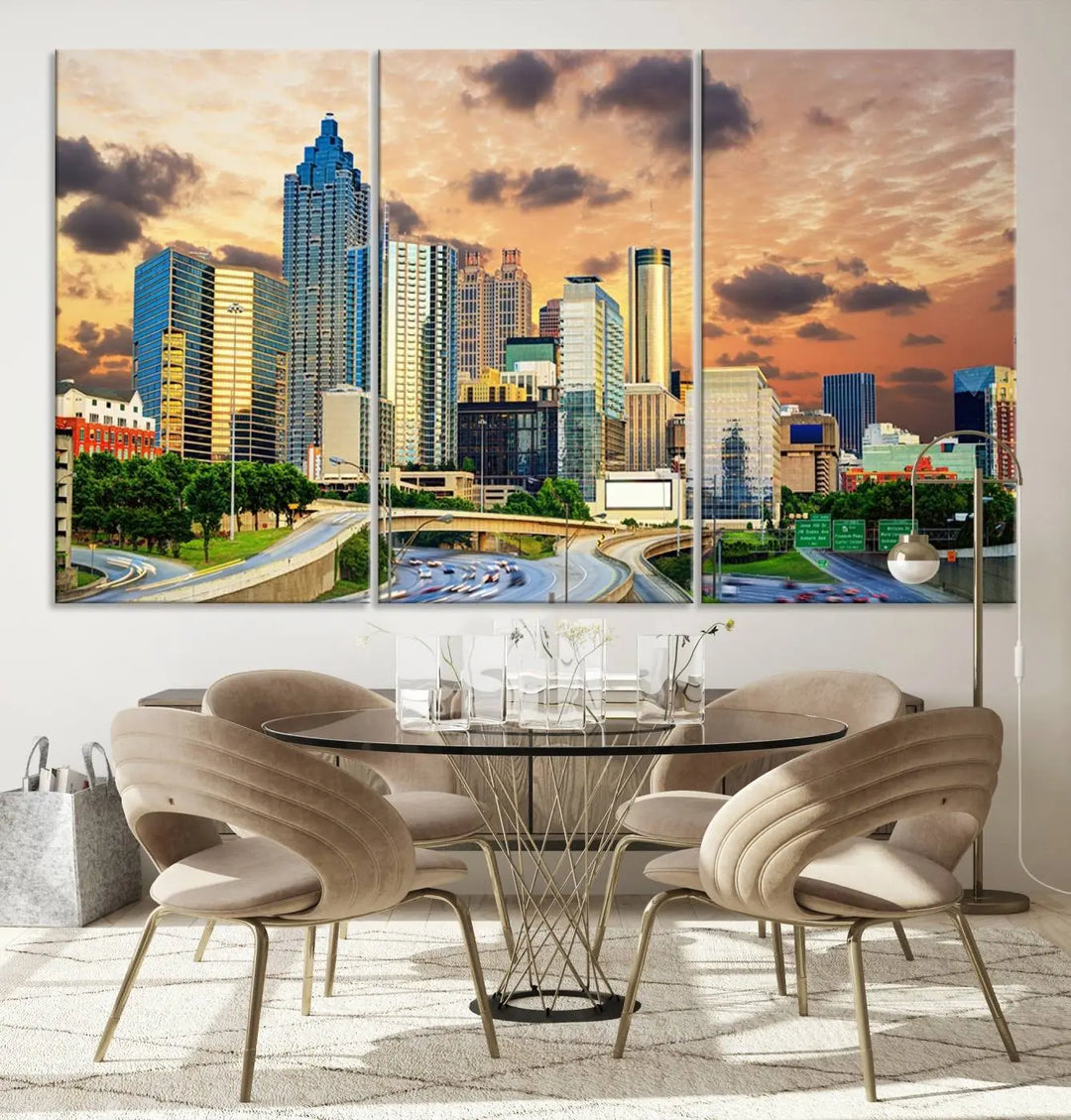 The wall is adorned with the Atlanta City Lights Sunset Skyline Cityscape View Wall Art Canvas Print, elegantly gallery wrapped and showcasing a skyline beneath a partly cloudy sky. This piece is created on museum-quality canvas and features a UV-protective coating to ensure lasting vibrancy.