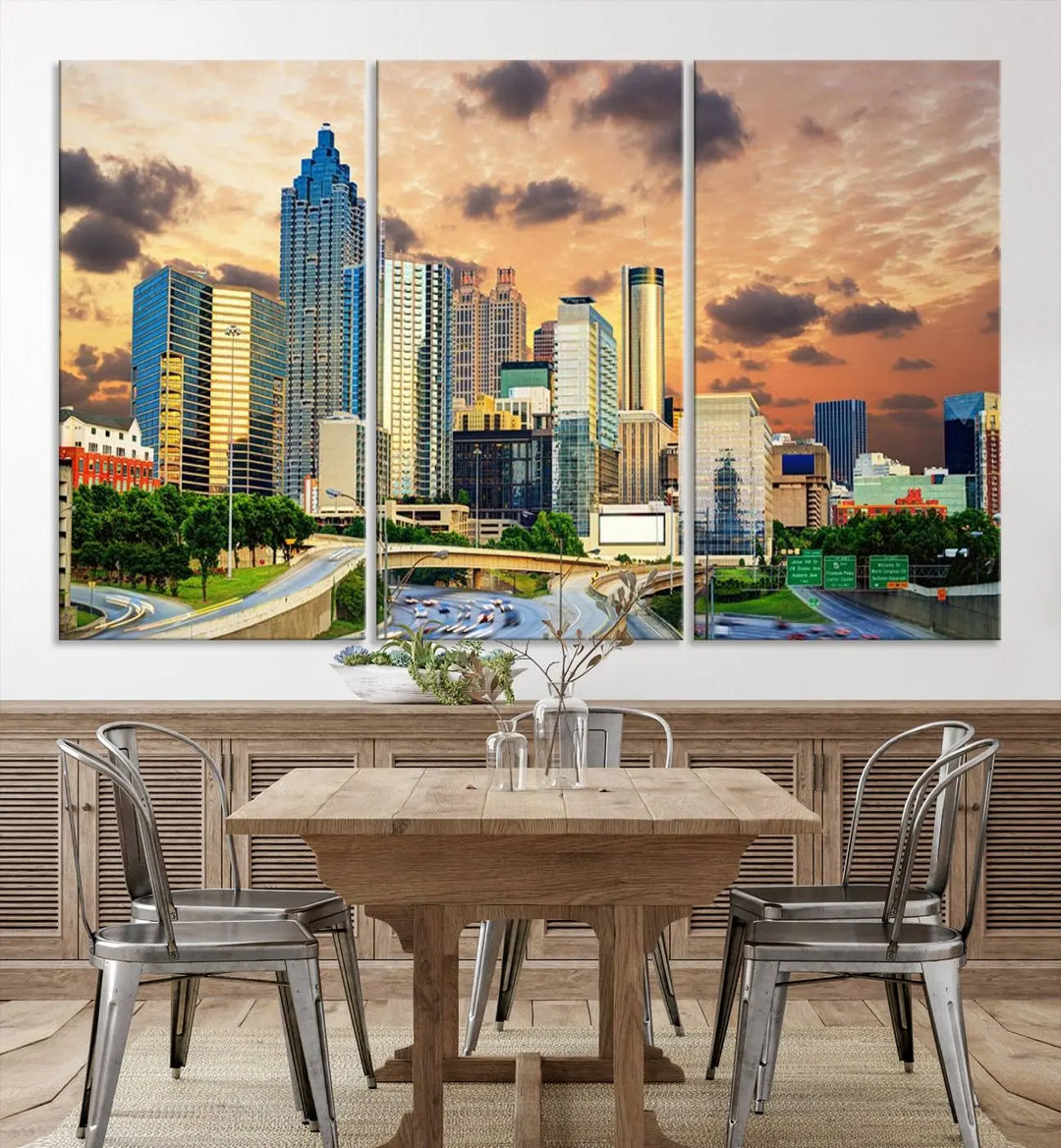 The wall is adorned with the Atlanta City Lights Sunset Skyline Cityscape View Wall Art Canvas Print, elegantly gallery wrapped and showcasing a skyline beneath a partly cloudy sky. This piece is created on museum-quality canvas and features a UV-protective coating to ensure lasting vibrancy.