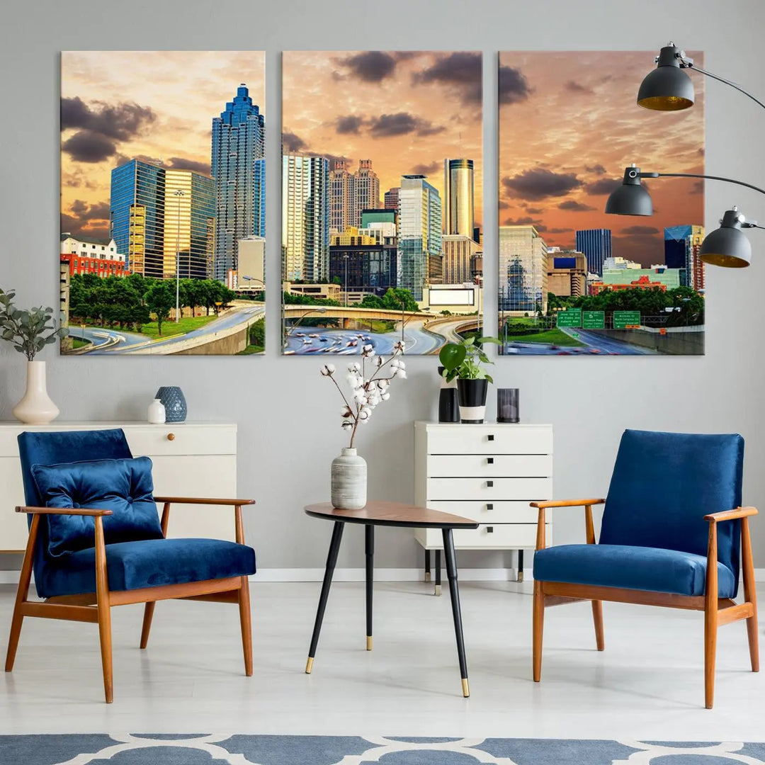 The wall is adorned with the Atlanta City Lights Sunset Skyline Cityscape View Wall Art Canvas Print, elegantly gallery wrapped and showcasing a skyline beneath a partly cloudy sky. This piece is created on museum-quality canvas and features a UV-protective coating to ensure lasting vibrancy.