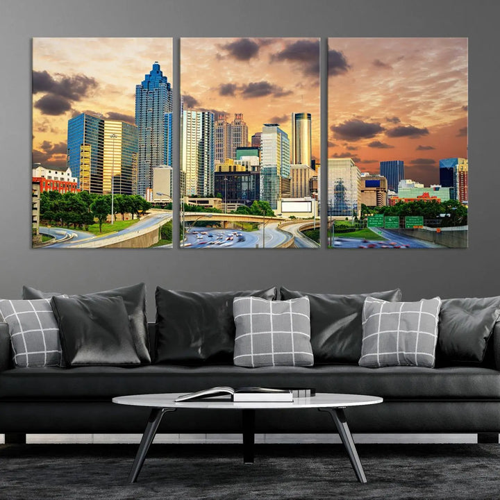 The wall is adorned with the Atlanta City Lights Sunset Skyline Cityscape View Wall Art Canvas Print, elegantly gallery wrapped and showcasing a skyline beneath a partly cloudy sky. This piece is created on museum-quality canvas and features a UV-protective coating to ensure lasting vibrancy.