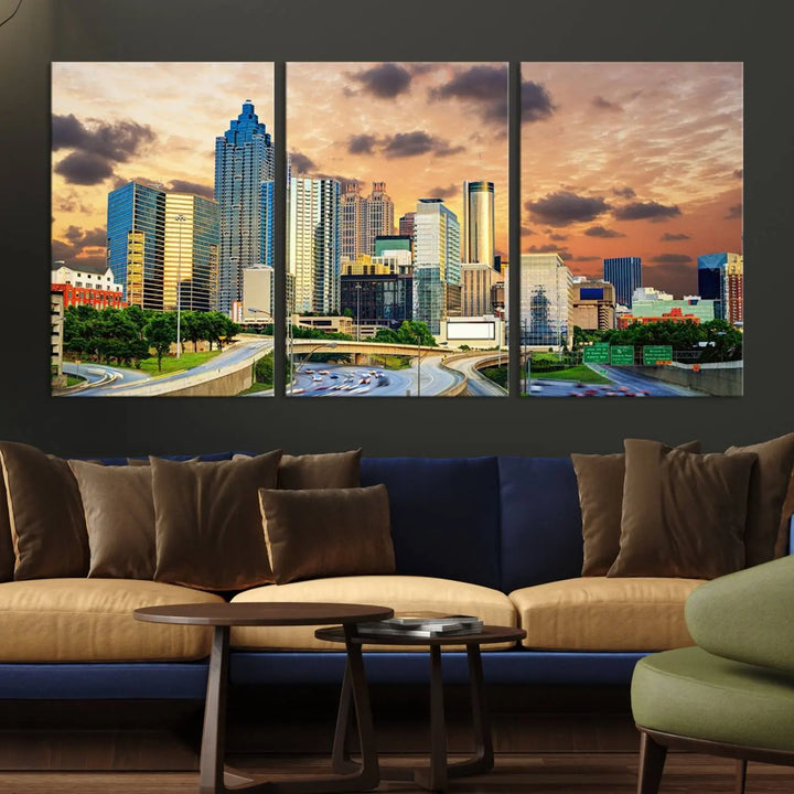 The wall is adorned with the Atlanta City Lights Sunset Skyline Cityscape View Wall Art Canvas Print, elegantly gallery wrapped and showcasing a skyline beneath a partly cloudy sky. This piece is created on museum-quality canvas and features a UV-protective coating to ensure lasting vibrancy.