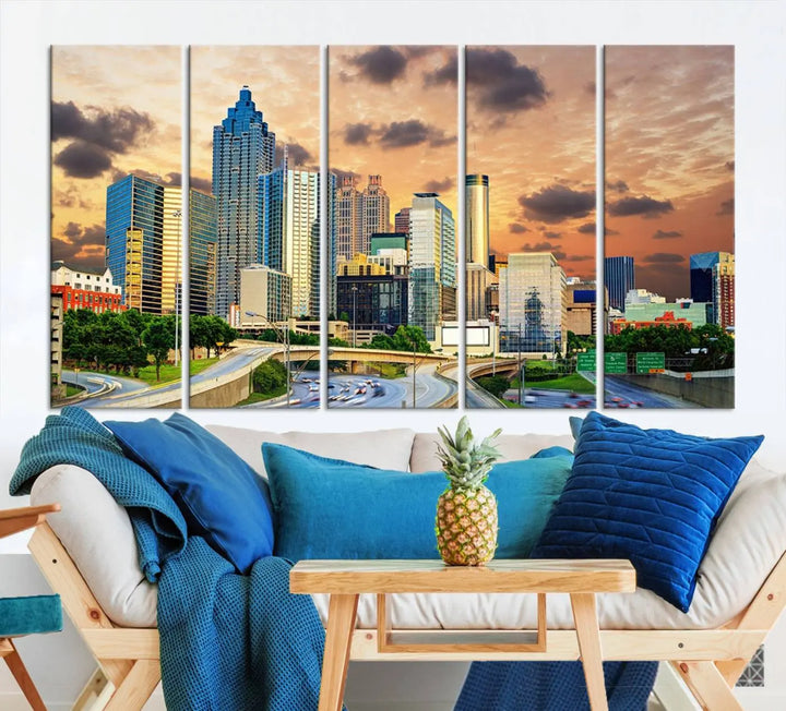 The wall is adorned with the Atlanta City Lights Sunset Skyline Cityscape View Wall Art Canvas Print, elegantly gallery wrapped and showcasing a skyline beneath a partly cloudy sky. This piece is created on museum-quality canvas and features a UV-protective coating to ensure lasting vibrancy.