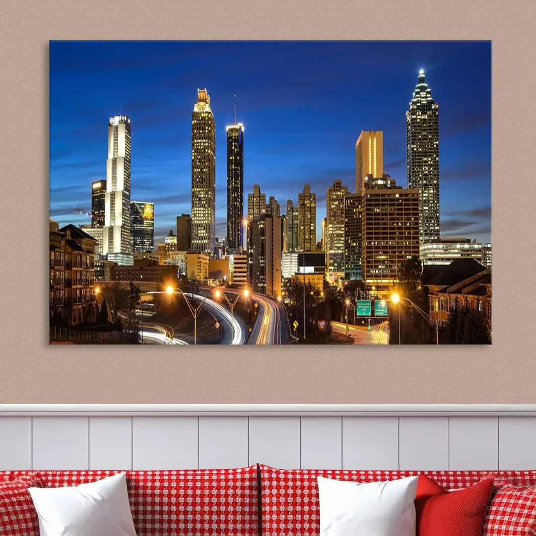 A modern living room is enhanced by the "Atlanta Cityscape View Wall Art Canvas Print" displayed as a triptych on museum-quality canvas. The hand-assembled framed art adds sophistication, crafting an inviting atmosphere. Complete your stylish space effortlessly with free shipping.